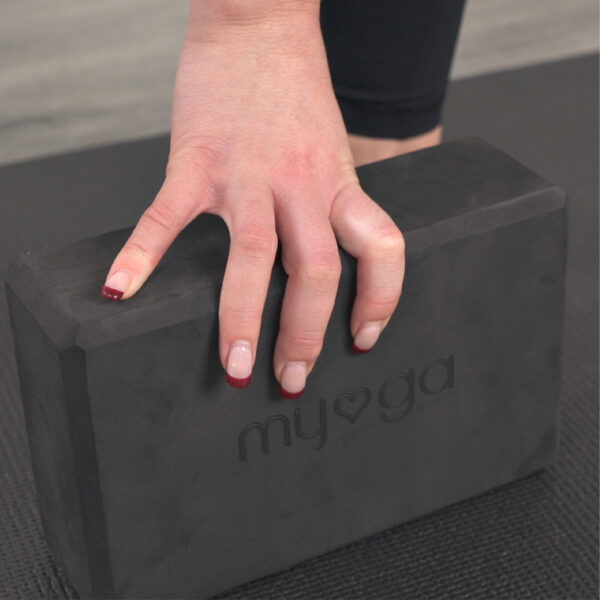 Hands on Black Yoga Block