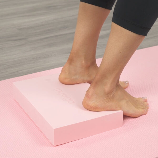 Pink heel support for your yoga practise