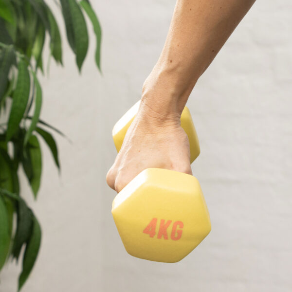 4kg yellow dumbbell in hand