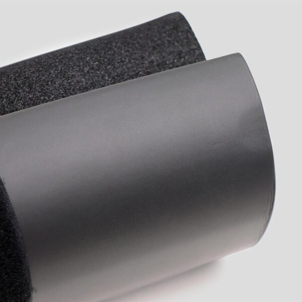 Close up of the black barbell pad.